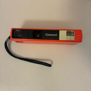 Concord 110EF Neon Lites Orange Pocket Camera Built-in Electronic Flash Vintage